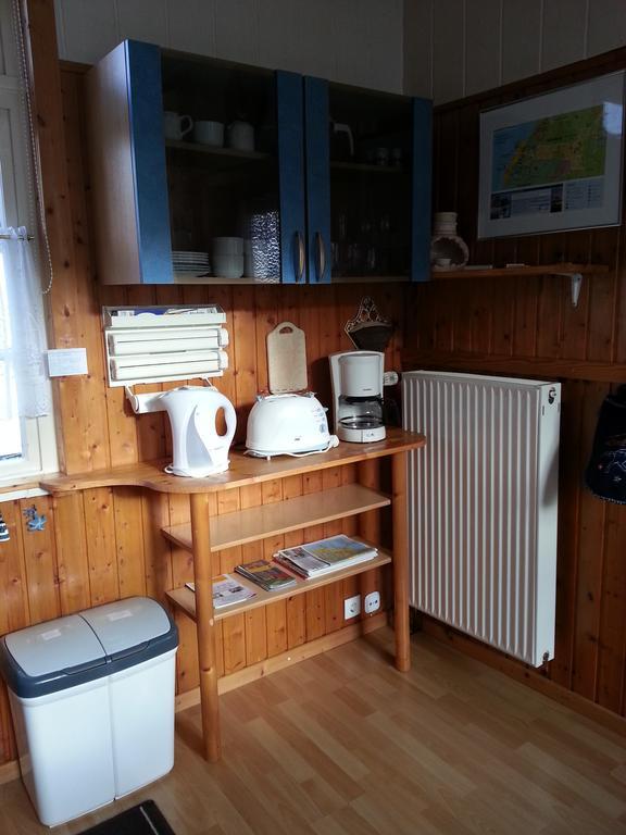 Вилла Ferienhaus Weiser Куксхафен Номер фото
